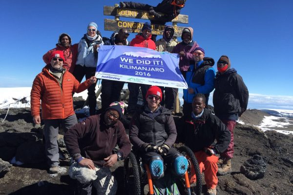 Aaron Phipps makes it to the summit of Mt Kilimanjaro with all terrain Mountain Trike wheelchair